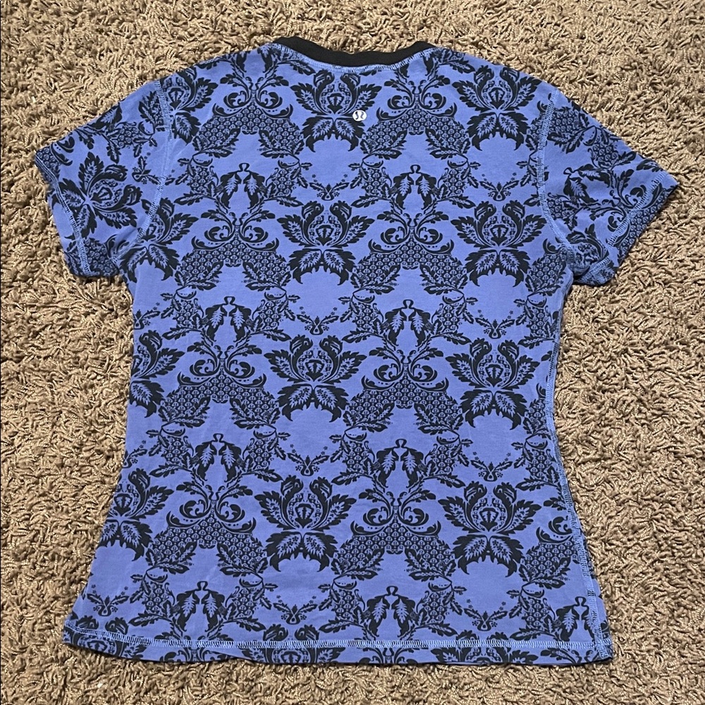 Hard to find Vintage Lululemon- unique damask logo design!